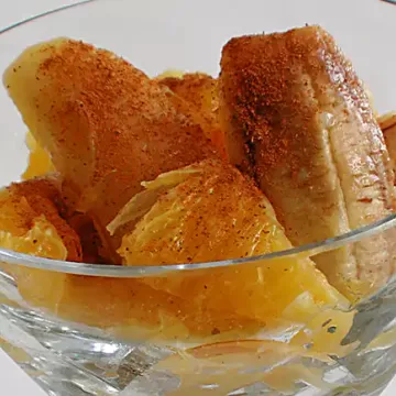 Banana e laranja cozidas com gengibre