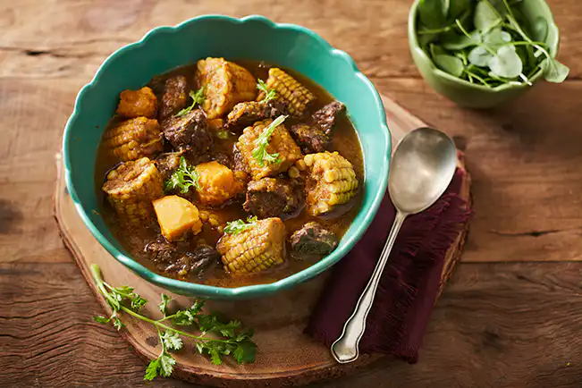 Carne de panela com milho e abóbora