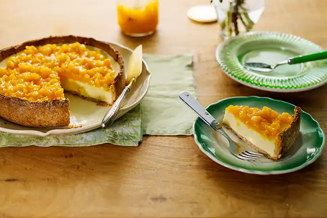 Cheesecake com calda de damasco