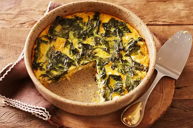 Receita de Clafoutis de abóbora com couve e queijo meia-cura