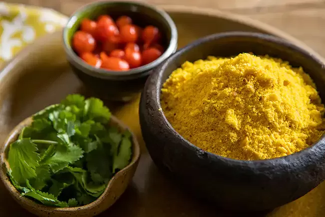 Receita de Farofa de castanha-de-caju com dendê
