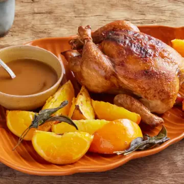 Frango assado com molho de laranja