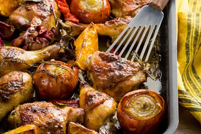 Receita de Frango assado (coxa e sobrecoxa) com laranja