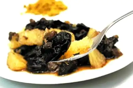 Frutas cozidas ao curry