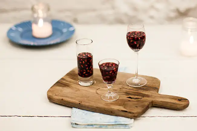 Sementes de romã com vinho