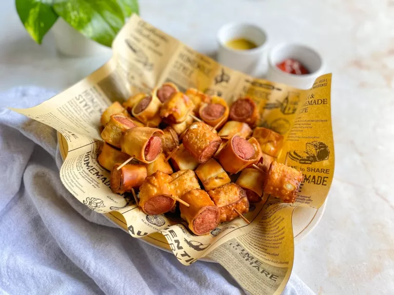 Receita de Enroladinho de salsicha com massa de pastel